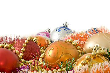 Image showing Christmas greeting decoration - colorful baubles and tinsel 