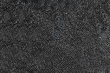 Image showing Black ornamental fabric with sparkles