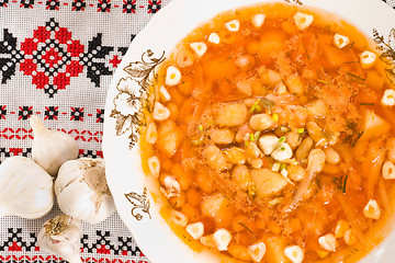 Image showing Borsch and heads of garlic