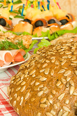 Image showing Balyk, chops and bread on table