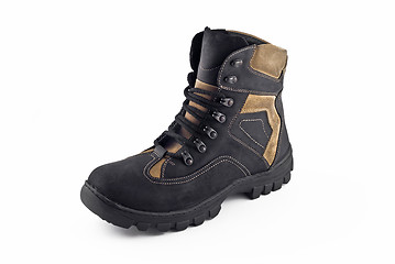 Image showing Warm leather boot for wearing in winter or traveling isolated