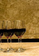 Image showing Glasses with red wine on marble