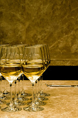 Image showing Glasses with white wine on marble