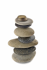 Image showing Stability, wealth and welfare - stone stack with coins