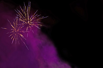 Image showing Bright Fireworks at night in the black sky