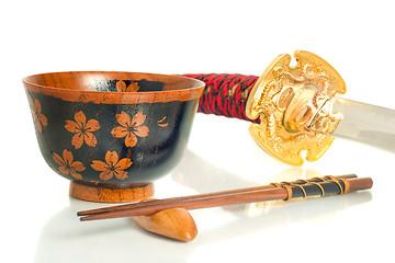 Image showing Katana, Chopsticks and bowl over white