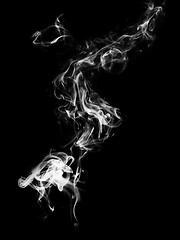 Image showing White abstract smoke curves on black