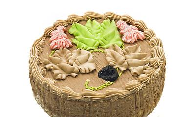 Image showing Birthday chocolate cake with creamy leaves