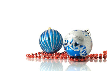 Image showing Christmas decoration -  two blue balls and red beads