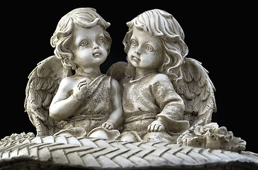 Image showing Two beautiful angels sitting