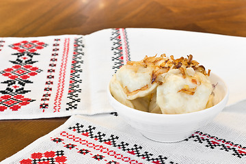 Image showing Ukrainian Traditional cuisine - dumplings with onion