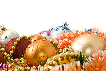 Image showing Colorful Christmas decoration balls and bright tinsel 