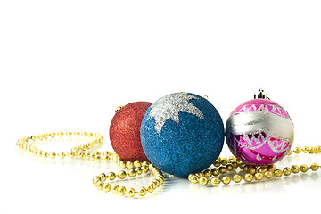 Image showing Christmas decoration - red, pink and blue balls with beads