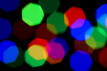 Image showing Blurred holiday colorful lights over black