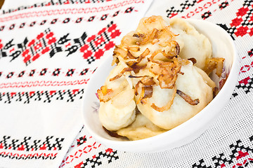 Image showing Ukrainian dishes - dumplings with fried onion