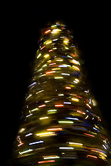 Image showing Blurred rotating New Year tree