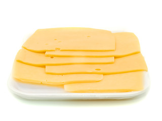 Image showing Sliced hard cheese over white