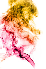 Image showing Bright colored abstract fume curves over white