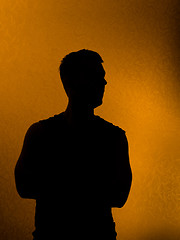 Image showing Confidence. Back lit silhouette of man 