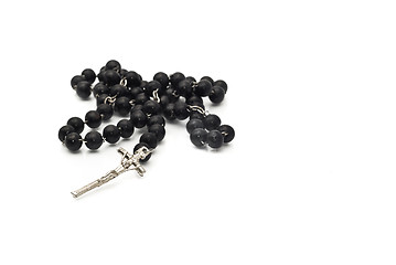 Image showing Black beads isolated over white 