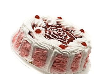 Image showing Tasty desserts - iced cake with cherries