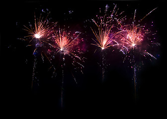 Image showing Fireworks in the dark at night 