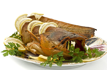 Image showing Shore dinner - sheatfish with lemon and parsley