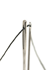 Image showing Needles with black thread