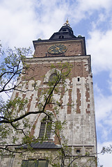 Image showing Town hall with clock in summer Krakow