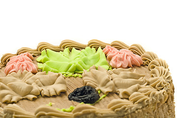 Image showing Closeup of Birthday chocolate cake with creamy leaves