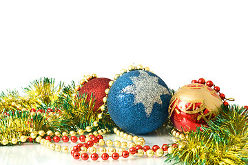 Image showing Christmas is coming. Decoration - colorful tinsel and balls