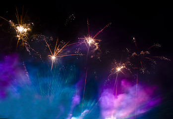 Image showing Fireworks in the lilac and blue smoke 
