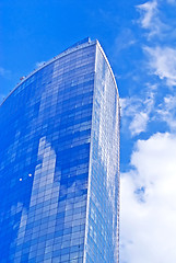 Image showing Modern cityscape: tall futuristic skyscraper 