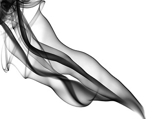 Image showing Puff of black abstract smoke patterns over white