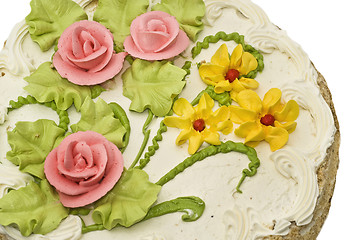 Image showing Close-up of tasty cake with cream, pink roses