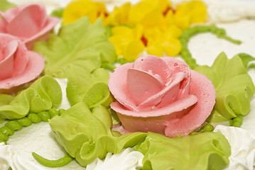 Image showing Dessert - Close-up of tasty cake with cream, pink roses 