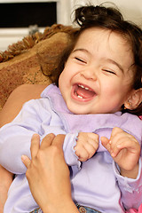 Image showing Giggling baby girl
