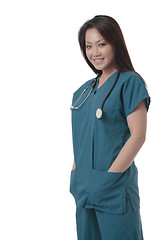 Image showing Attractive Asian nurse in scurbs