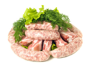 Image showing Tasty meat. Pieces of Pork and Sausages