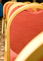 Image showing Meeting. Closeup of red Chair back
