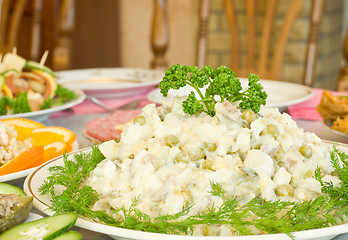 Image showing Tasty Russian salad. Banquet in the restaurant
