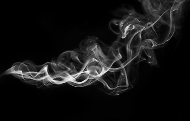 Image showing White Abstract fume shape over black