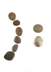 Image showing Negative sad emoticon assembled of pebble