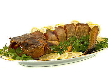 Image showing Tasty dinner - bloated fresh-water catfish on the plate