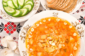 Image showing Borsch, black bread, vodka