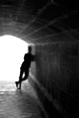 Image showing Blurred human silhouette against the light