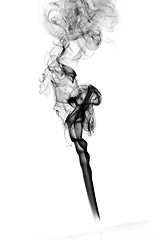 Image showing Puff of black abstract smoke curves over white