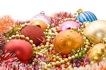 Image showing Colorful Christmas decoration - baubles, tinsel, beads