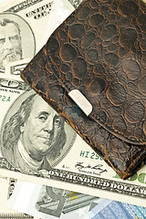 Image showing Closeup of Old wallet, US dollar banknotes