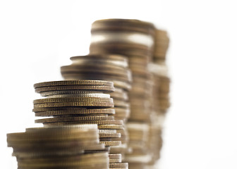 Image showing Growth - towers assembled of coins shallow DOF 